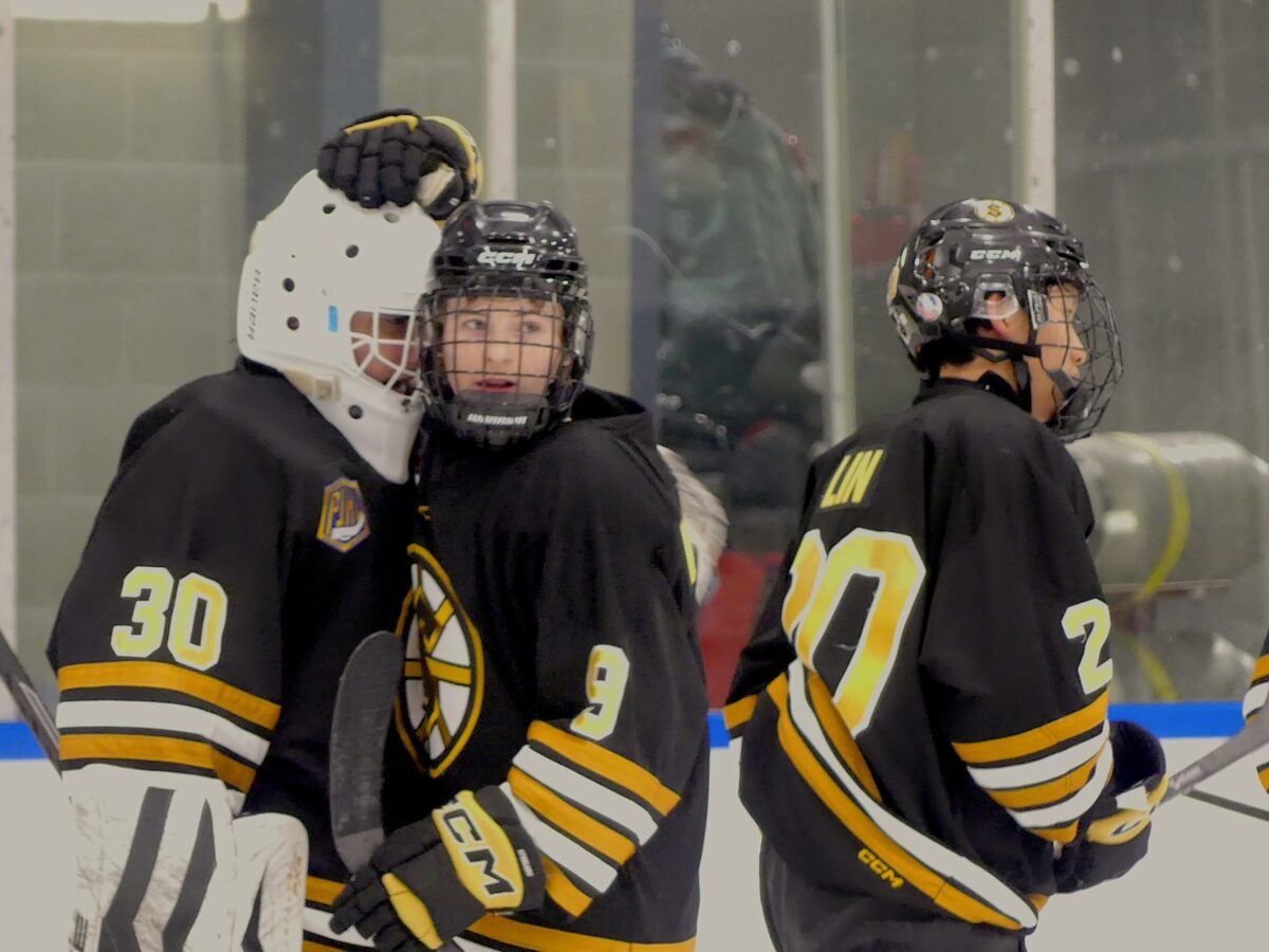Shayan Kermany embracing the win celly from Josh Mantle